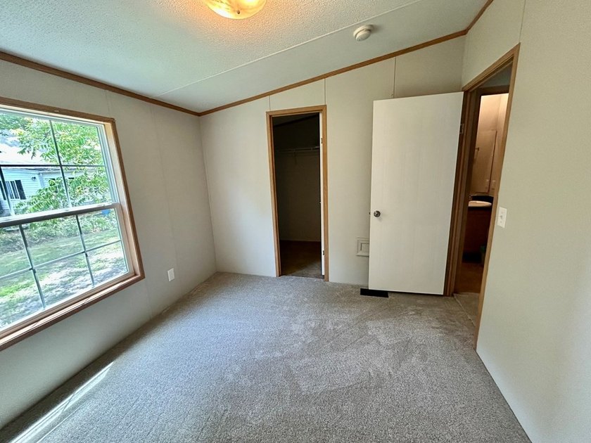 This 3-bedroom, 2-bathroom home is located on the outskirts of - photo 6