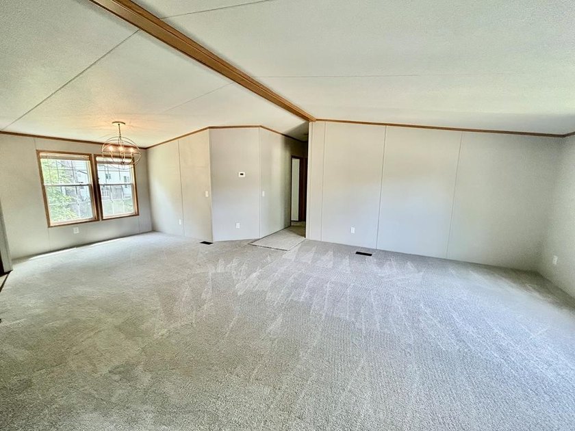 This 3-bedroom, 2-bathroom home is located on the outskirts of - photo 8