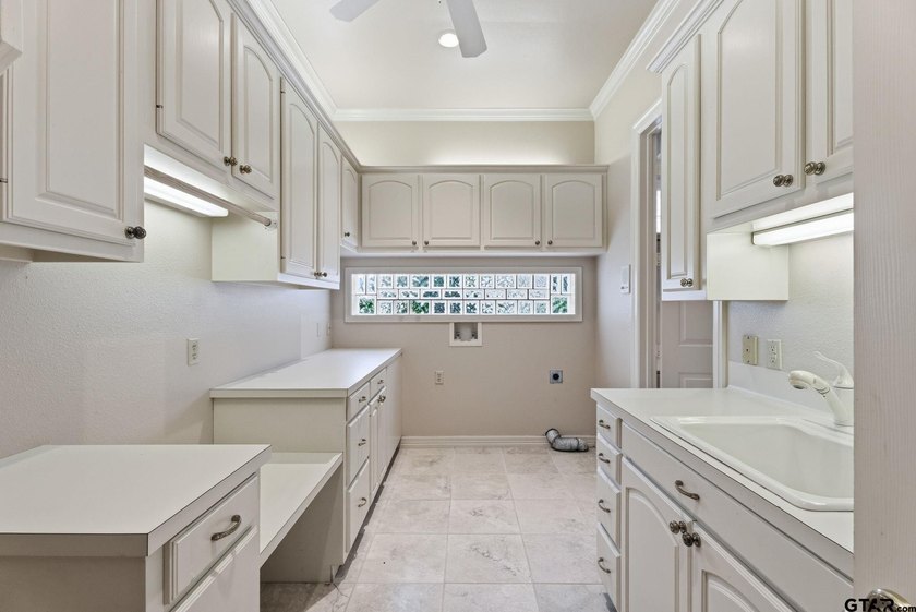 This extraordinary estate is located in the gated community of - photo 42