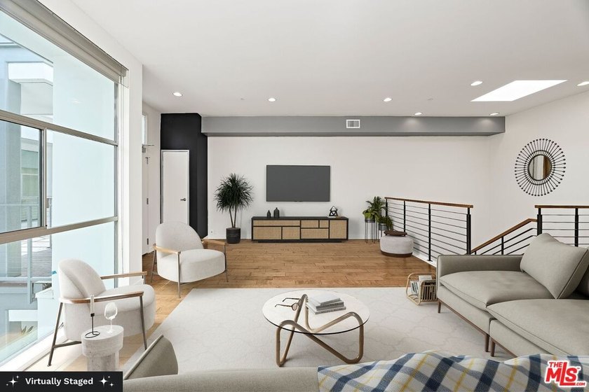 Enjoy beachside living in this bright and spacious two-story, 3 - photo 6