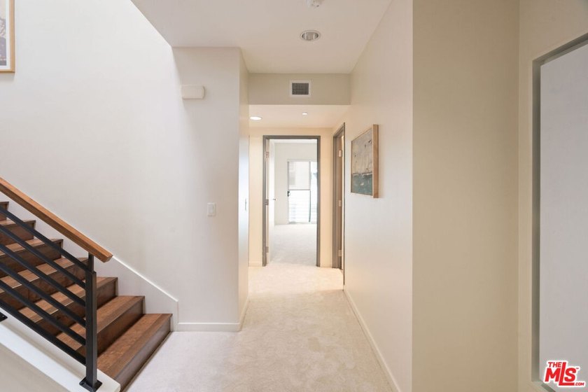 Enjoy beachside living in this bright and spacious two-story, 3 - photo 9