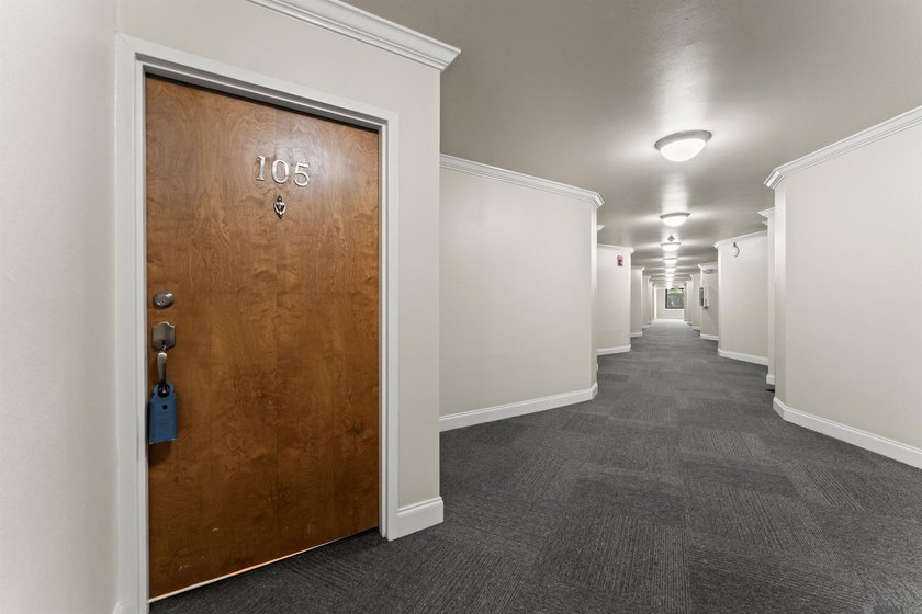 UNIT 105 - BEAUTIFUL FIRST FLOOR UNIT. DOWNTOWN LIVING AT ITS - photo 11