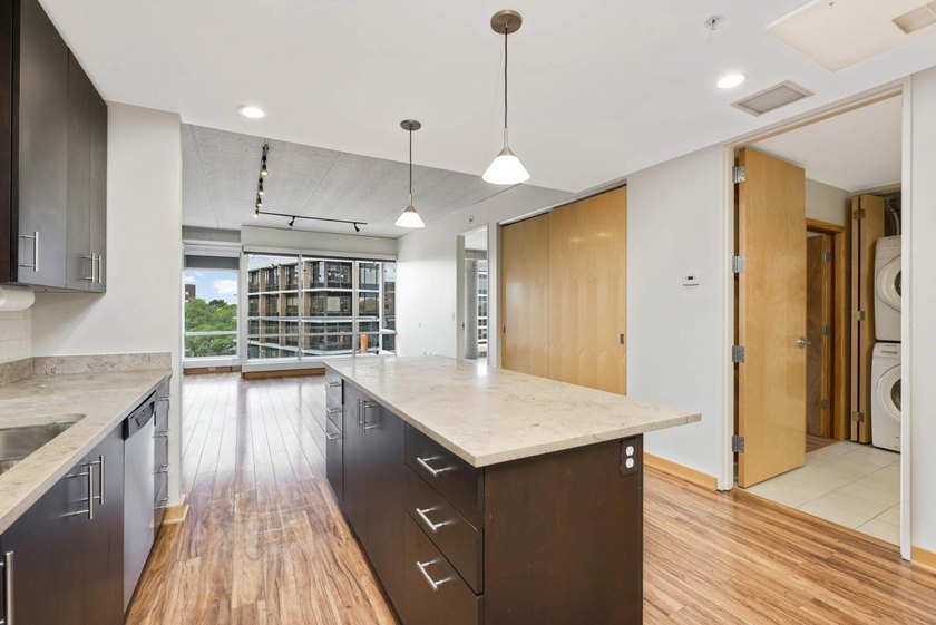 This stylish 1 bed condo at Cobalt offers an unmatched level of - photo 12