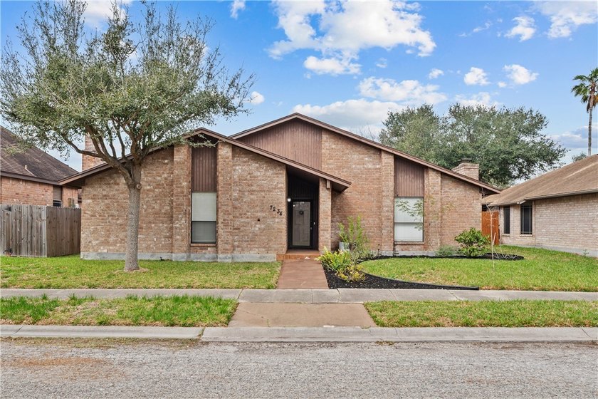 Step into this charming 3 bedroom, 2 bathroom house located in - photo 2