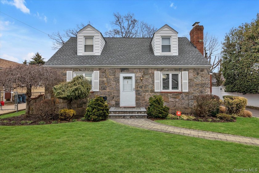 4BR Fully Dormered Fieldstone/Brick Cape w/GREAT CURB APPEAL! - photo 2