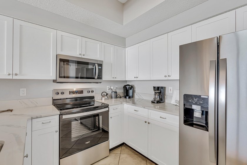 UPDATED CONDO located at Majestic Sun with direct garage access - photo 11