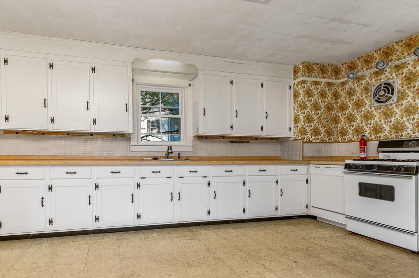 Welcome to 22 Rogers Road, a classic 1875 New Englander nestled - photo 3