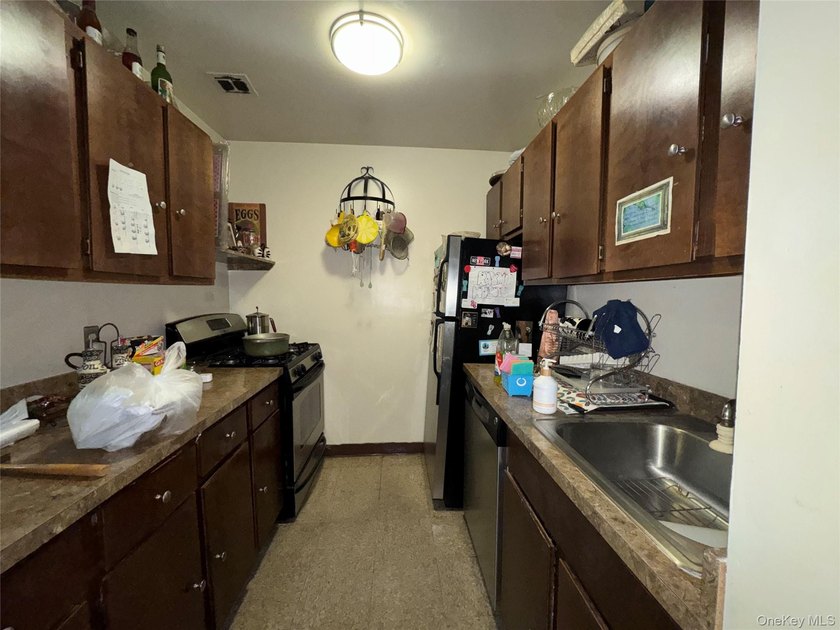 Rare Value in Ocean Hill - 2BR Condo Awaiting Your Vision Estate - photo 5