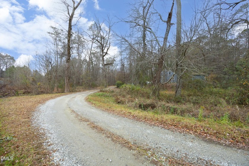 NO HOA &amp; 1.64 ACRES! Welcome home to this secluded and charming - photo 15