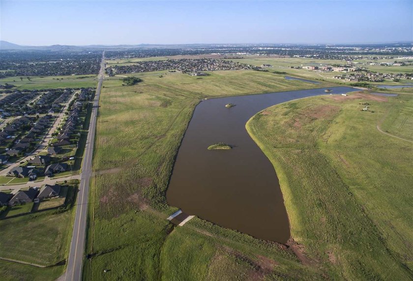 This is a spacious corner home site for sale at The Bluffs at - photo 3