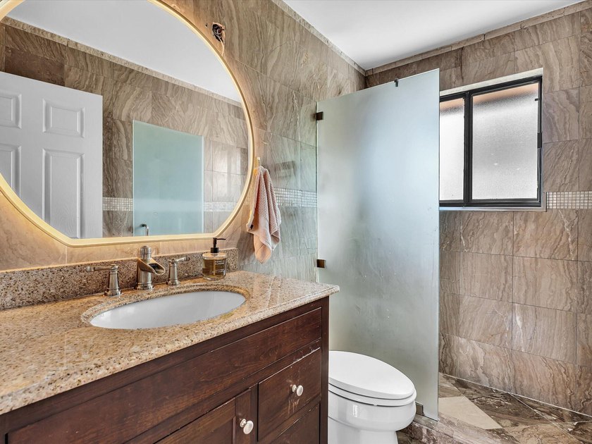 Welcome to this well-appointed three-bedroom - photo 33