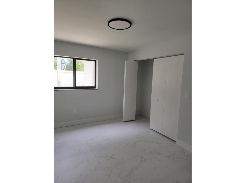 I am pleased to present this fully renovated, with new - photo 14