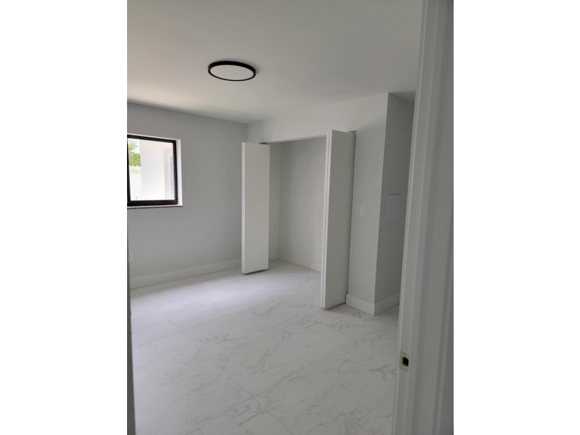 I am pleased to present this fully renovated, with new - photo 16