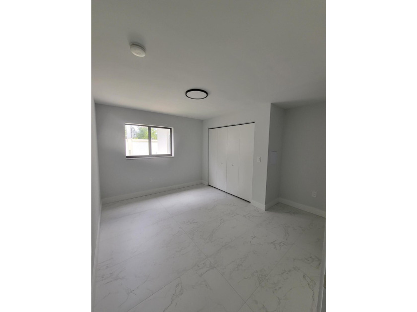 I am pleased to present this fully renovated, with new - photo 19
