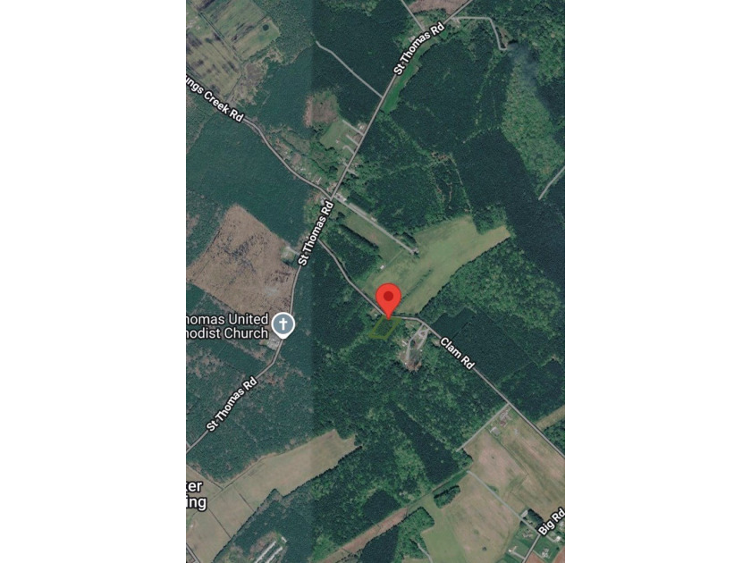 Discover the possibilities with this peaceful 1.5 acre wooded - photo 2