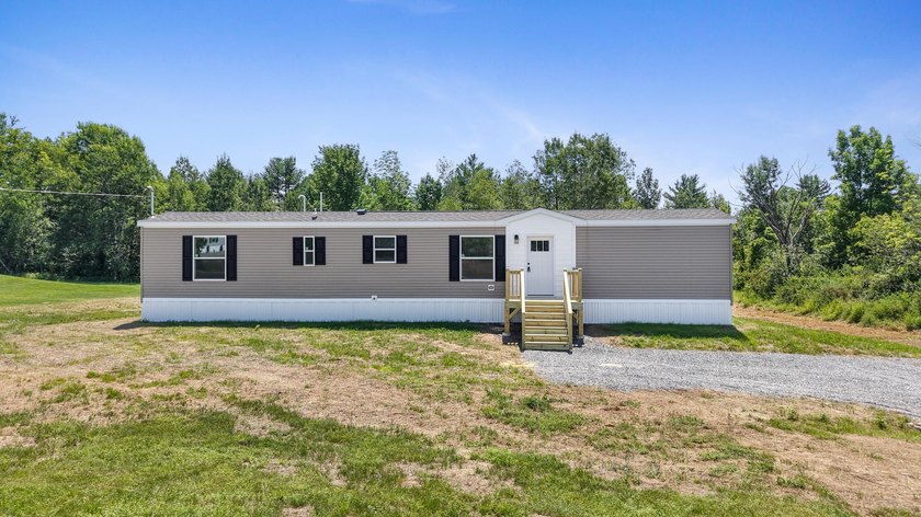 Welcome to easy, worry-free living in this brand-new 2-bedroom - photo 3