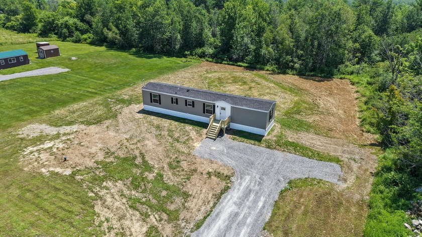 Welcome to easy, worry-free living in this brand-new 2-bedroom - photo 5