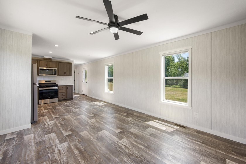 Welcome to easy, worry-free living in this brand-new 2-bedroom - photo 9