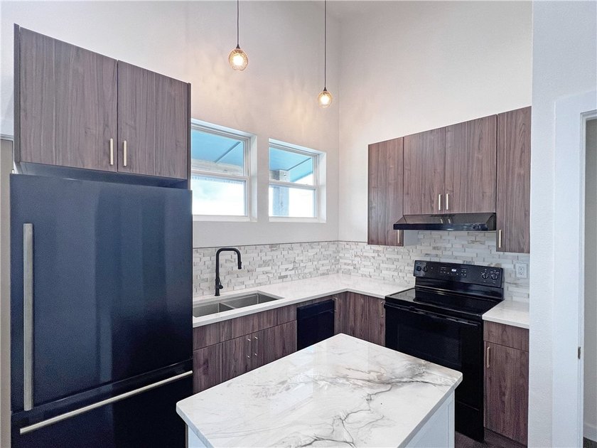 Discover modern design and effortless living in this stylish - photo 7