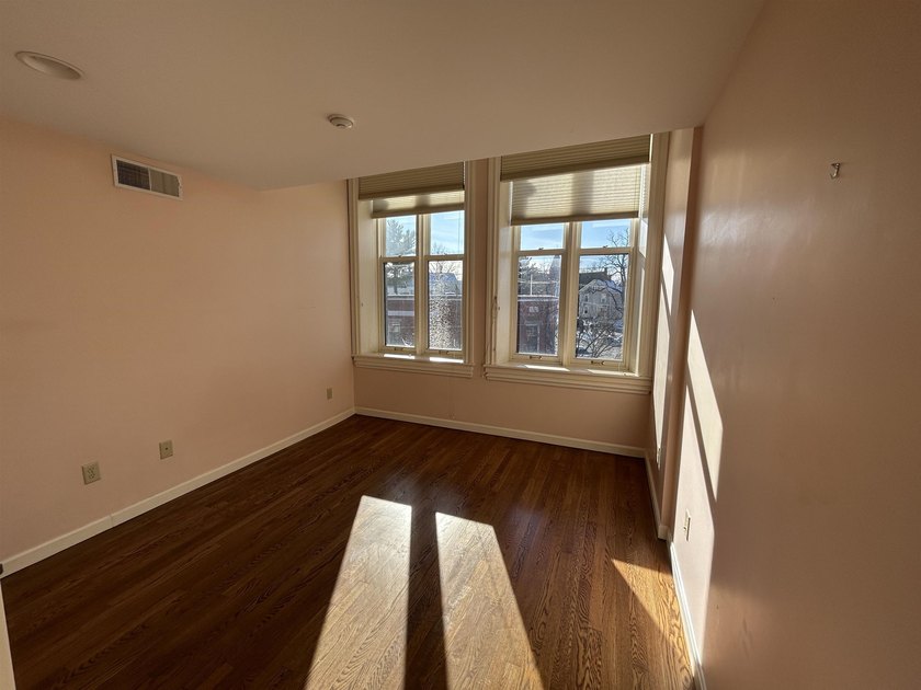 Welcome to this 2-bedroom condo nestled within the landmark - photo 8