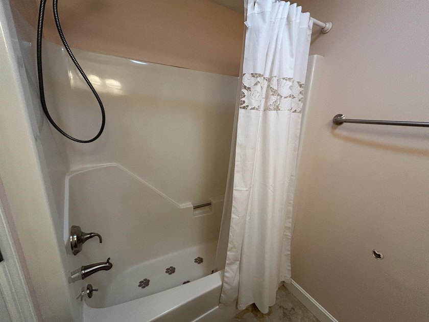 Welcome to this 2-bedroom condo nestled within the landmark - photo 9