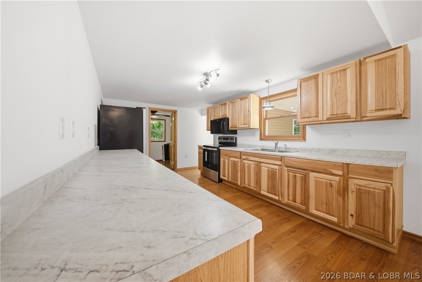 SELLER NOW OFFERING $5,000 TOWARDS CLOSING COSTS! Completely - photo 13
