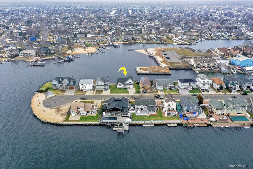 Set across a double parcel at the end of a quiet waterfront - photo 3