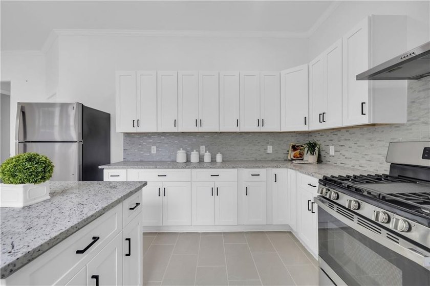 This stunning newly built residence in Douglasville offers the - photo 11