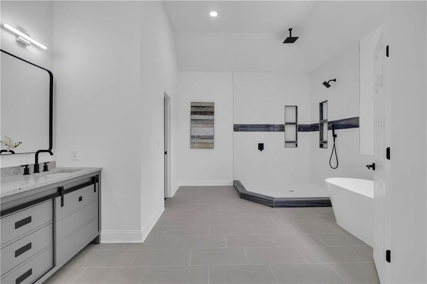 This stunning newly built residence in Douglasville offers the - photo 15