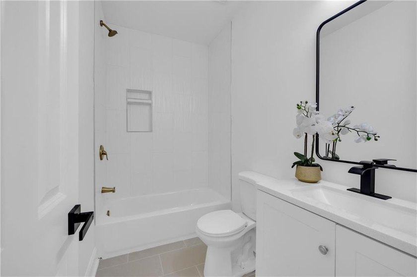 This stunning newly built residence in Douglasville offers the - photo 18