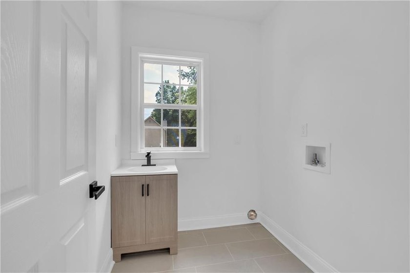 This stunning newly built residence in Douglasville offers the - photo 20