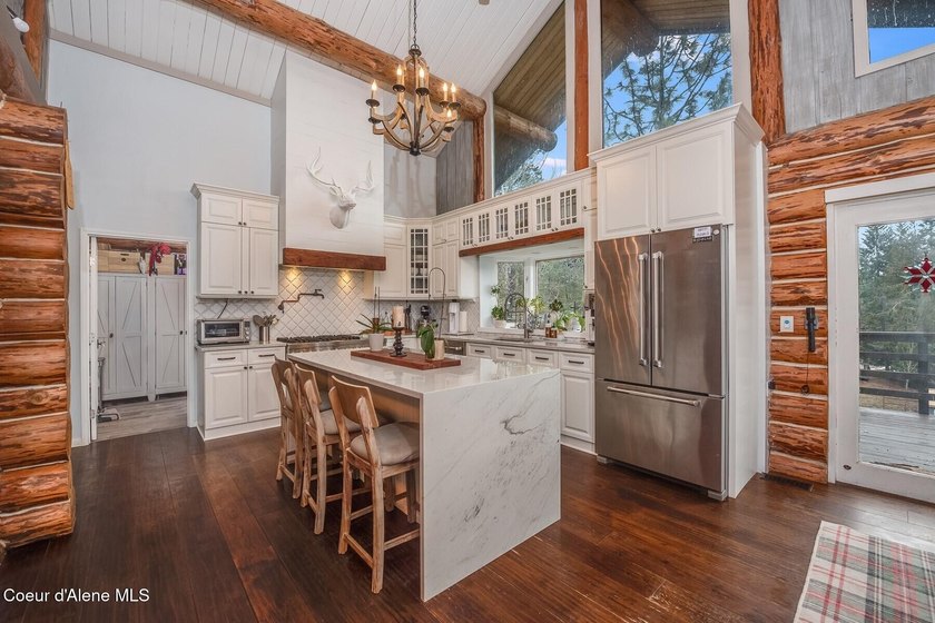 Perched on more than 8 private acres, this exceptional custom - photo 12