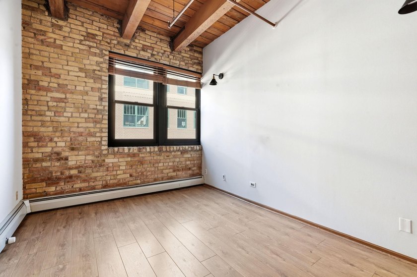 Located on a quiet street in the heart of the North Loop, you - photo 9