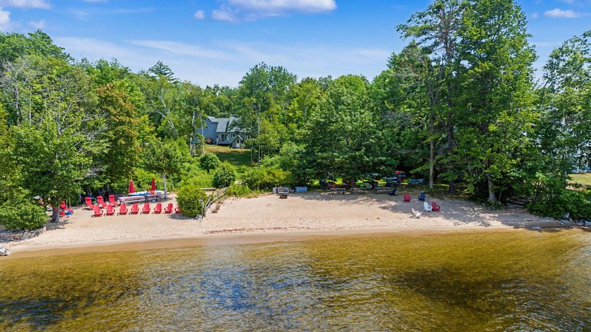 Experience the best of Maine lakefront living in this - photo 3