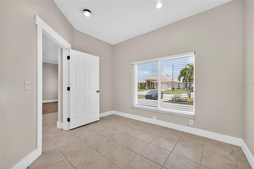 This 2,019-square-foot Cape Coral home features 3 Bedrooms, 2 - photo 44