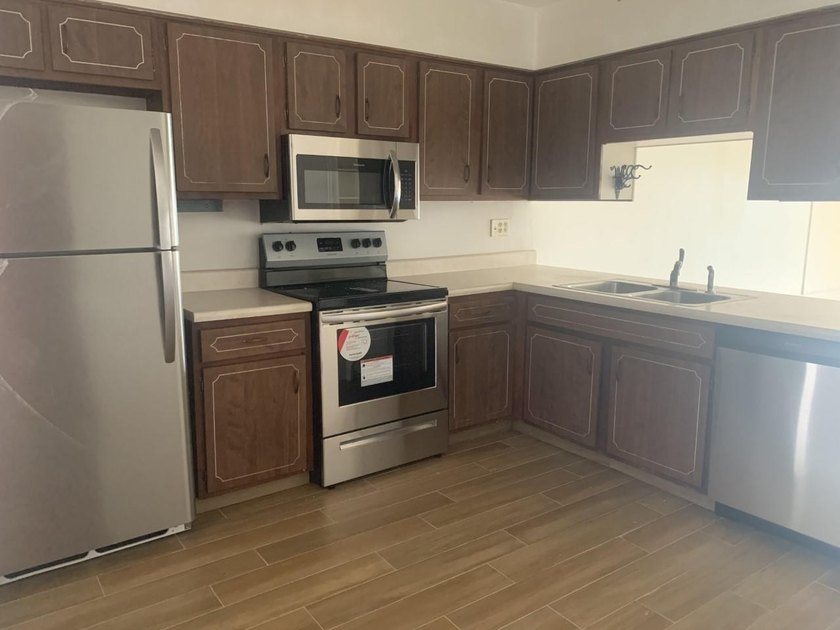 Beautifully updated 2-bedroom, 1-bath second-floor condo in the - photo 12