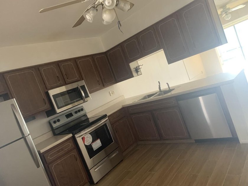Beautifully updated 2-bedroom, 1-bath second-floor condo in the - photo 13