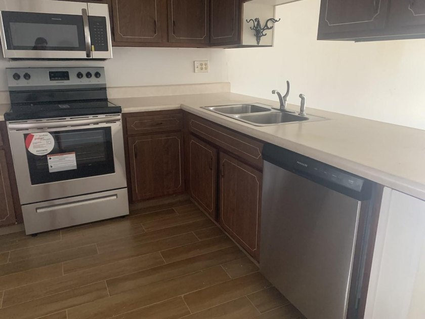 Beautifully updated 2-bedroom, 1-bath second-floor condo in the - photo 14