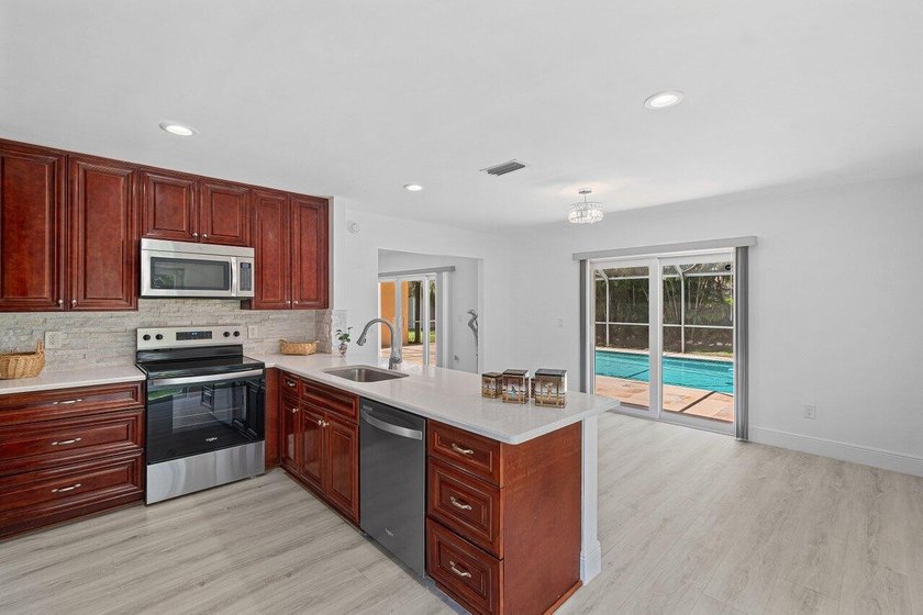Charming guard gated community in East Boca, 1 1/2 miles to - photo 30