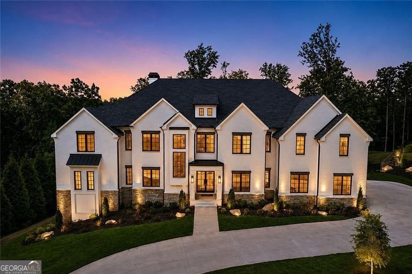 Beautiful, prime golf course and lake views set the stage for - photo 3
