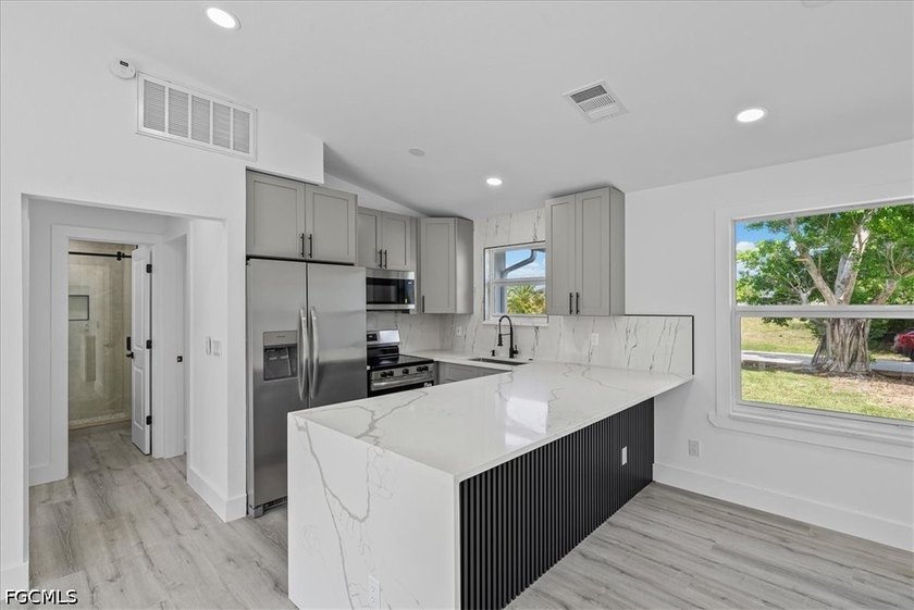 Welcome to this beautifully renovated Cape Coral home where - photo 13