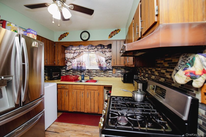 Legal two-family Colonial tucked away on large cul-de-sac - photo 13