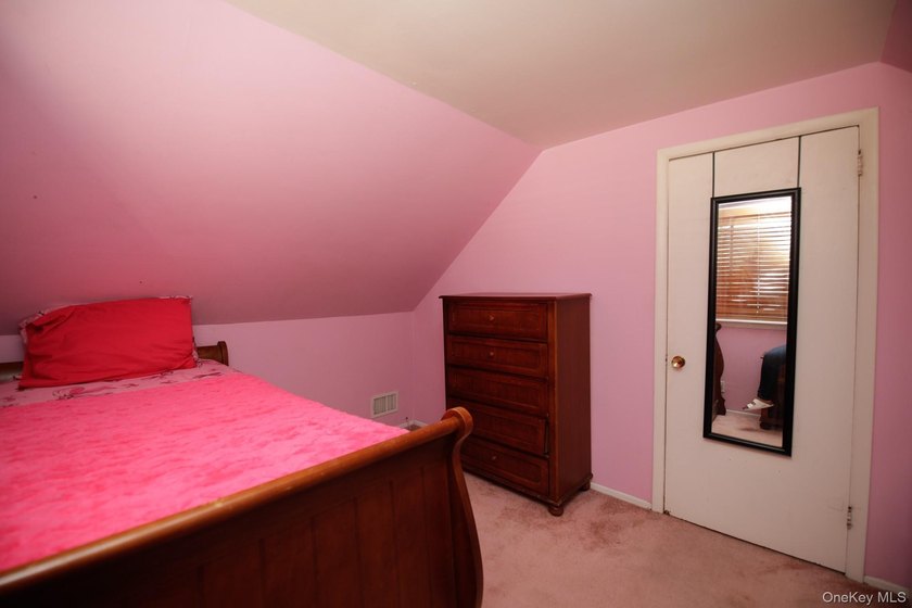 Legal two-family Colonial tucked away on large cul-de-sac - photo 22