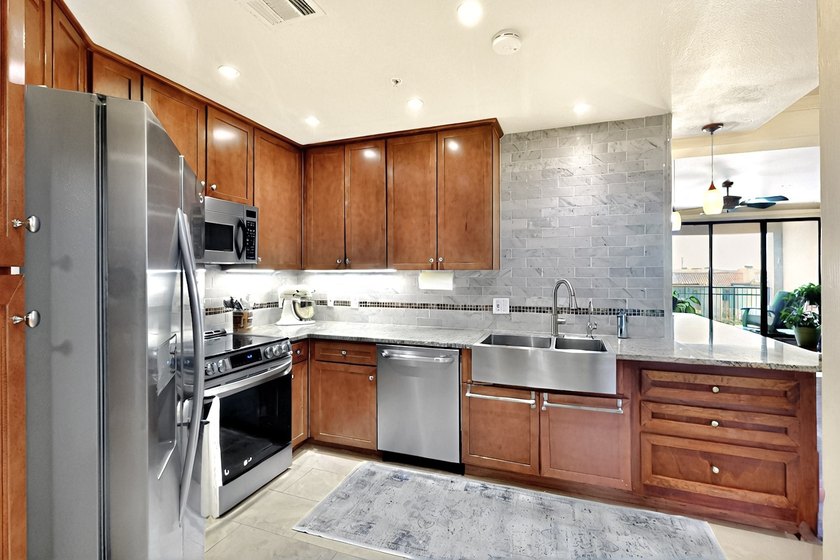 Discover this beautifully updated 2-bedroom, 2-bath condo on the - photo 3