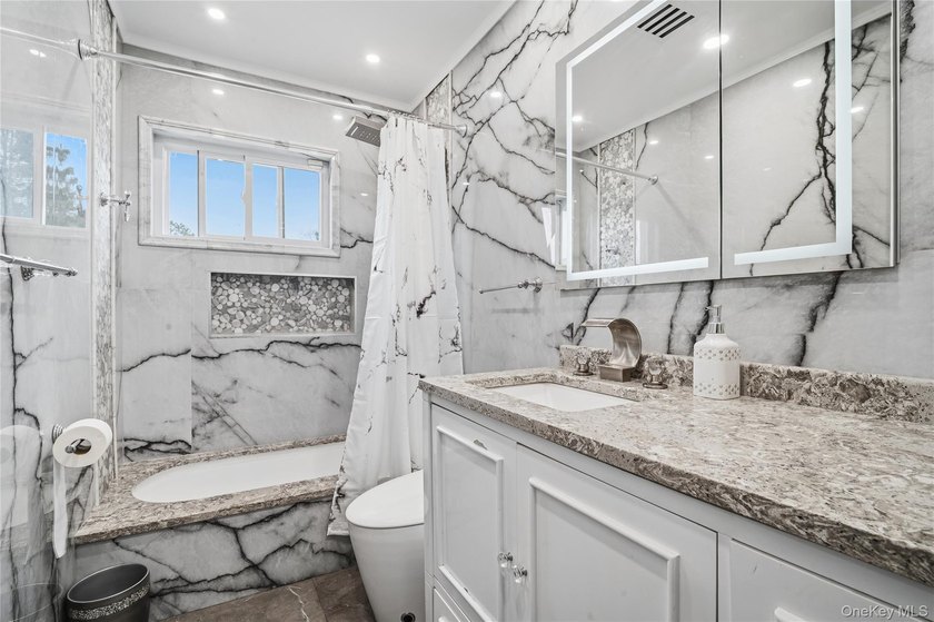 Welcome to 568 Centerwood Street in West Babylon, a hi-ranch - photo 6