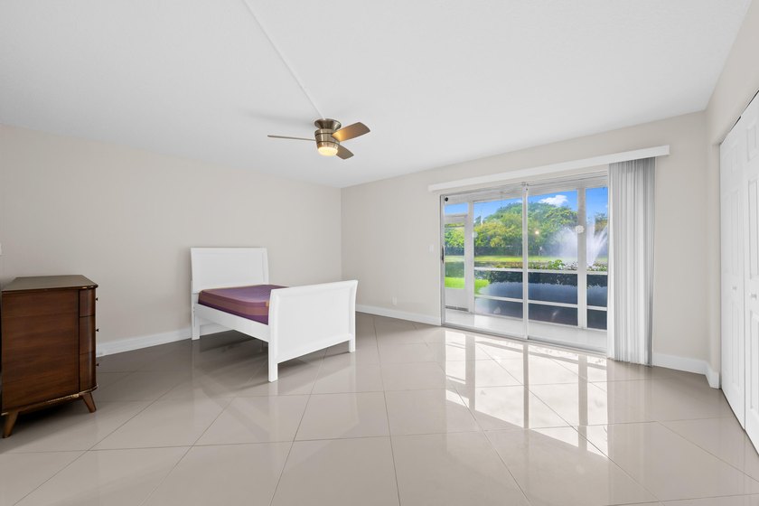 Enjoy peaceful lake and fountain views from this beautifully - photo 17