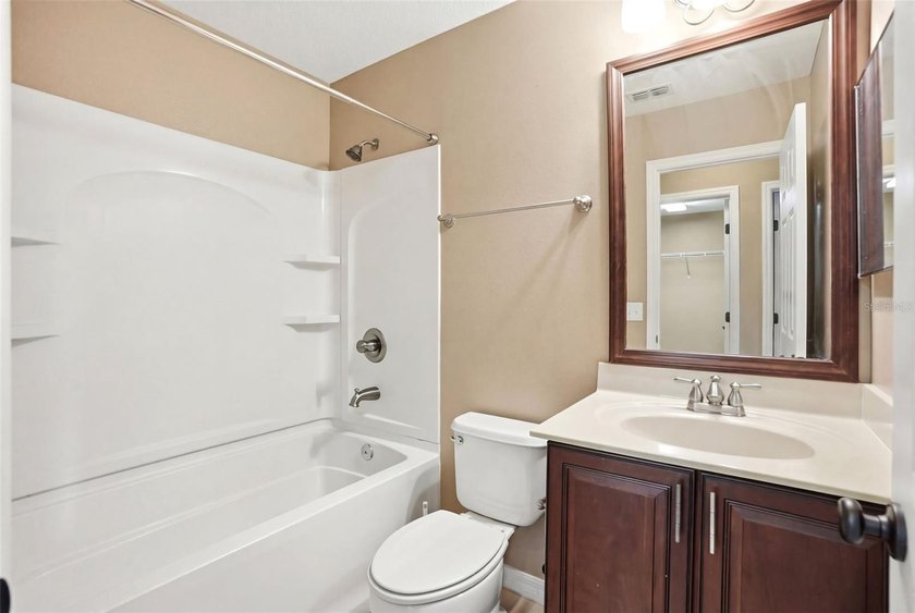 Virtually Staged. This former model corner unit townhome (3 bed - photo 11