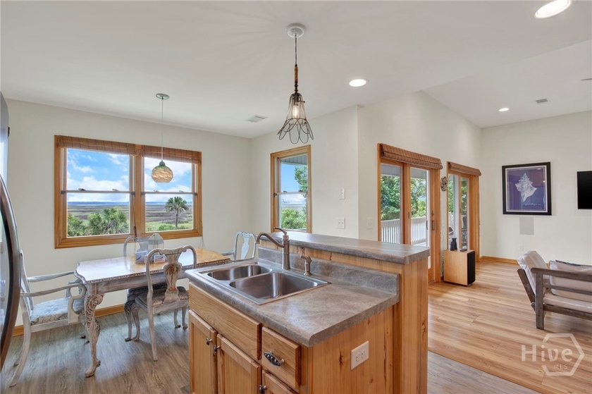 This custom-built coastal cottage sits on a scenic bluff - photo 12