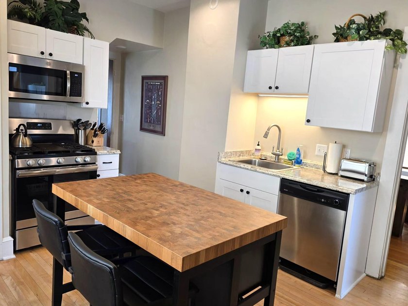Large update 4 bedroom, 1.5 bath home. 2 blocks from lake - photo 10