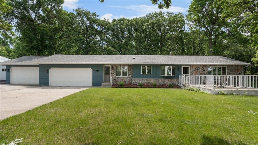 Welcome to this spacious 4-bedroom, 3-bath rambler just minutes - photo 3